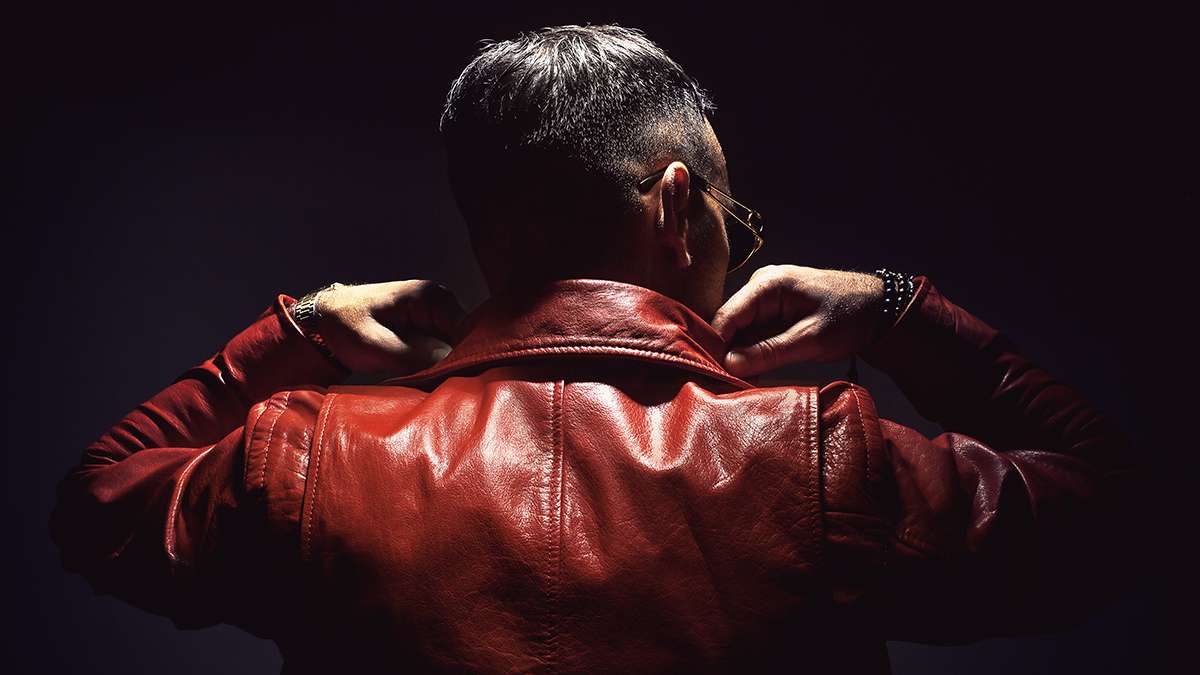 Adult,Man,In,Red,Leather,Jacket,,View,From,Back.